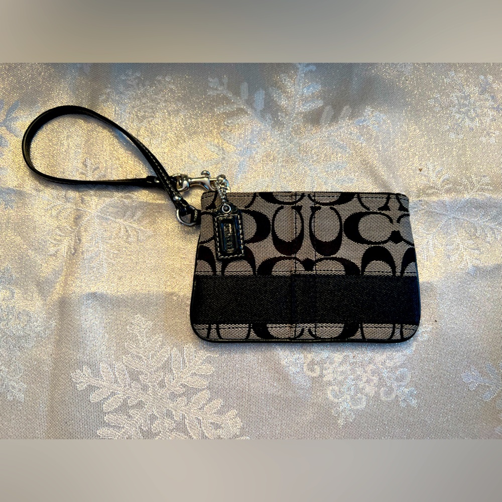 EUC Coach wristlet with stripe